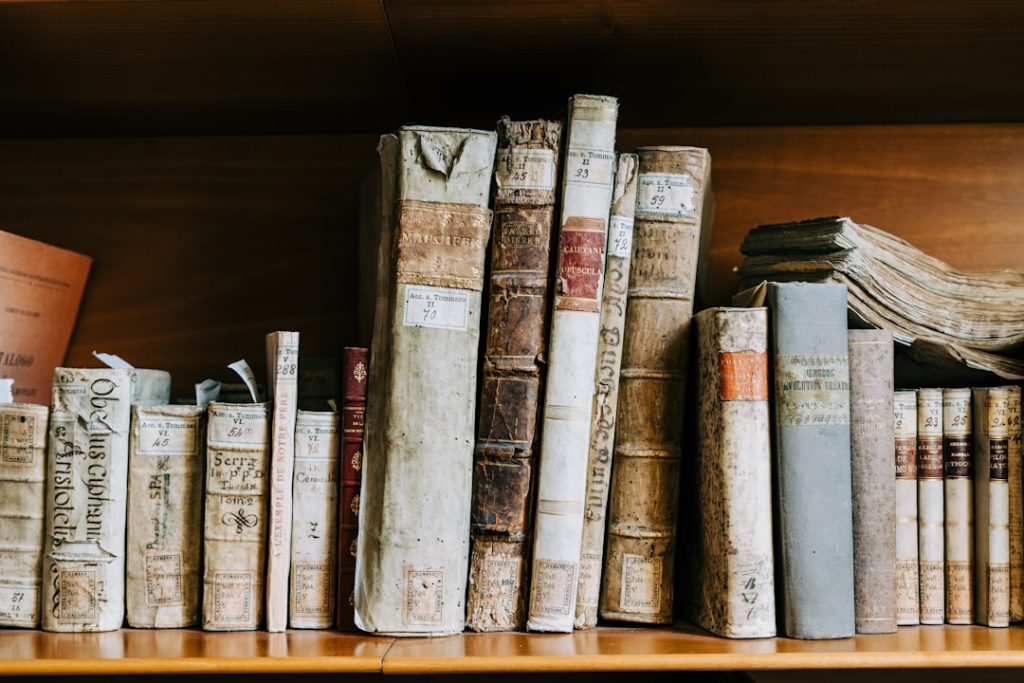 A bookshelf full of antique books