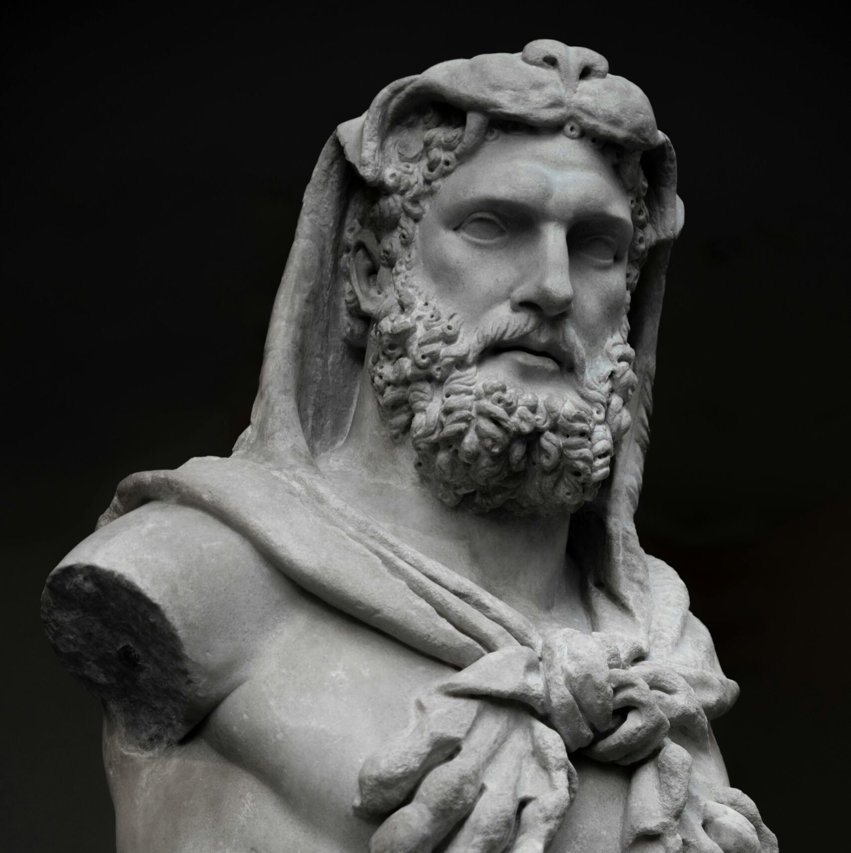 A dramatic marble sculpture of Hercules depicting classical Greek artistry and mythological themes.